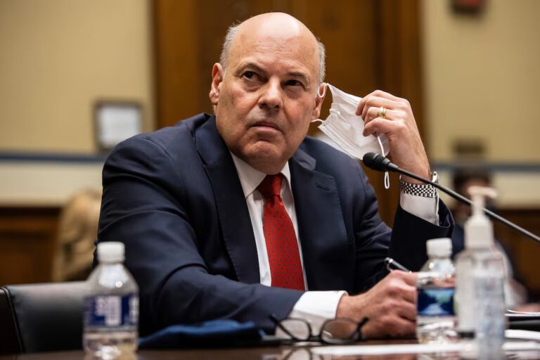 United States Postal Service Postmaster General Louis DeJoy looks on during a Feb. 24, 2021, House Oversight and Reform Committee hearing on Capitol Hill in Washington. (Graeme Jennings/Pool via AP)